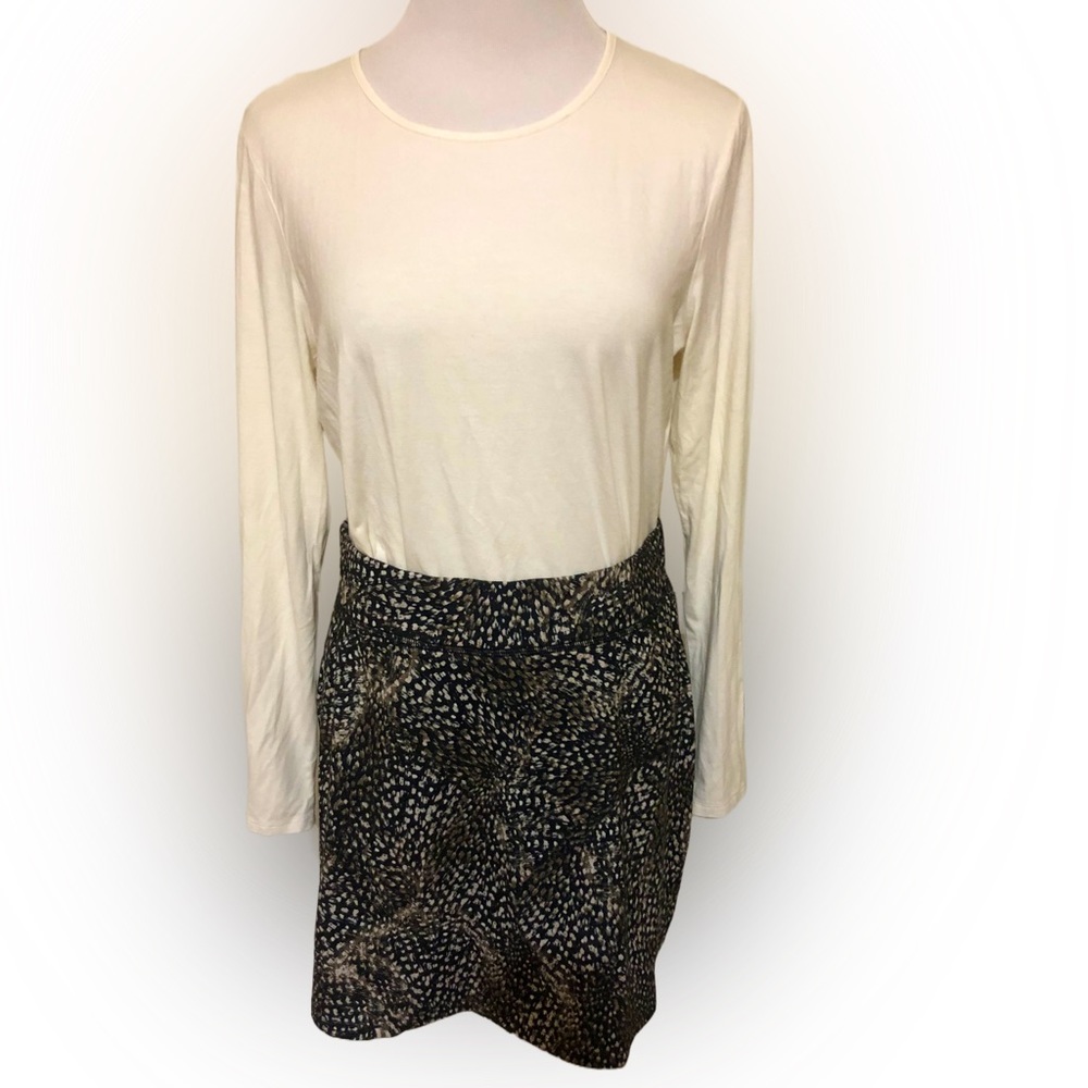 2- PC Jockeys skort and long sleeve cream color Cami by Chicos both size Medium.